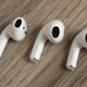 The AirPods 2nd Generation (left) compared to the new AirPods 3rd Generation (center) and the AirPods Pro with the silicone tip removed (right).